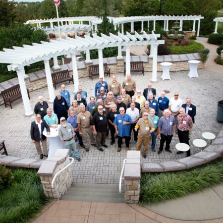 a group of people standing in a circle