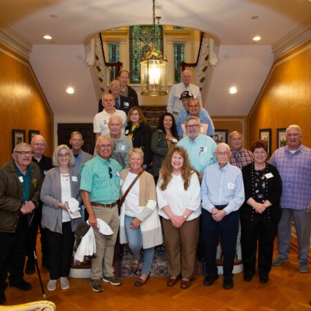 a group of people posing for a photo