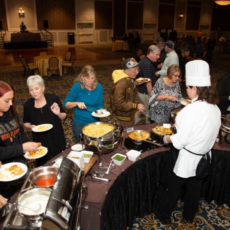 a group of people at a buffet