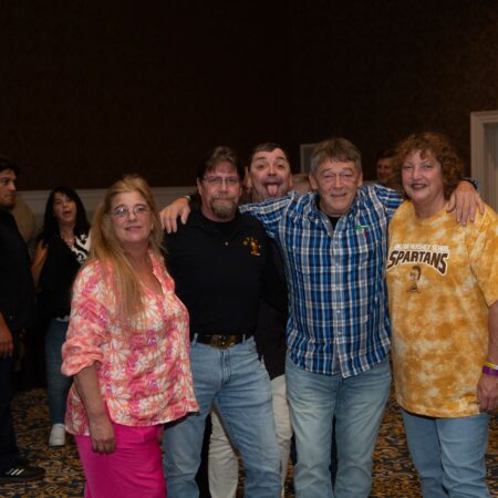 a group of people posing for a photo