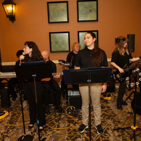 a group of people playing instruments
