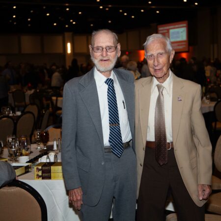 a couple of old men in suits