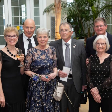 a group of people posing for a photo