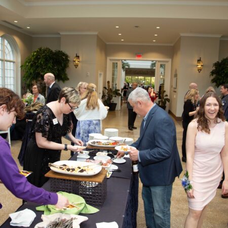 a group of people at a buffet