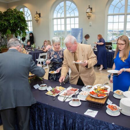 a group of people at a buffet