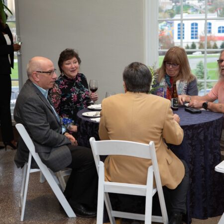 a group of people sitting at a table
