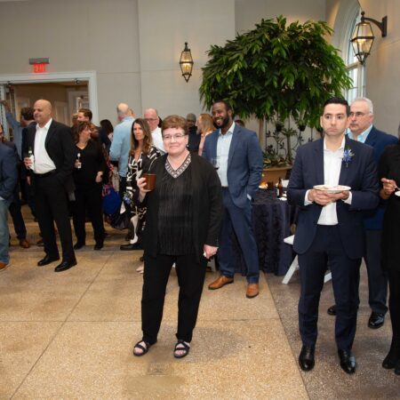 a group of people standing in a room