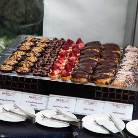 a tray of pastries and desserts