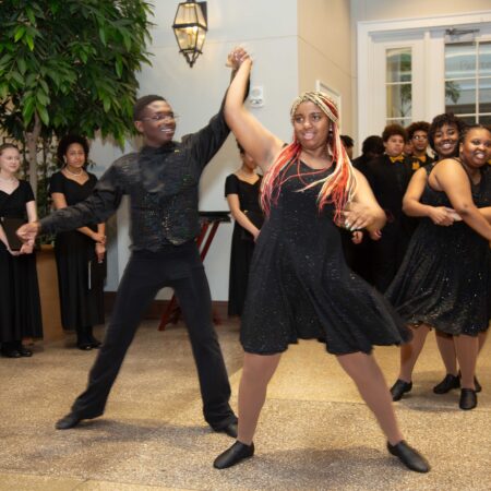people dancing in a room