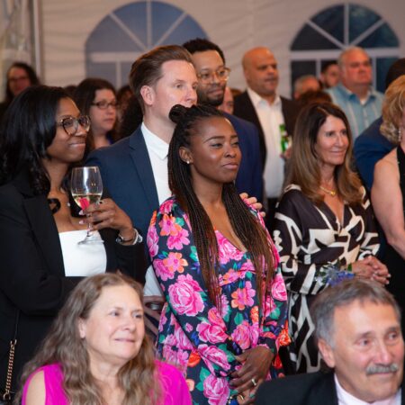 a group of people standing in a crowd
