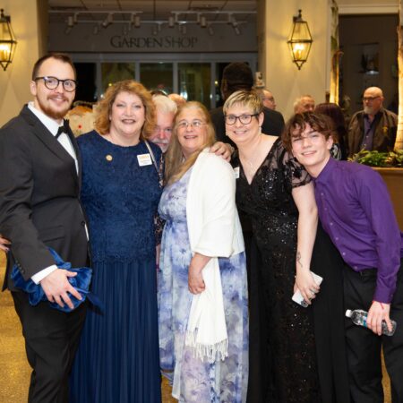 a group of people posing for a photo
