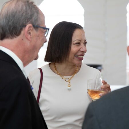 a person holding a glass of wine