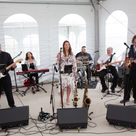 a group of people performing on stage