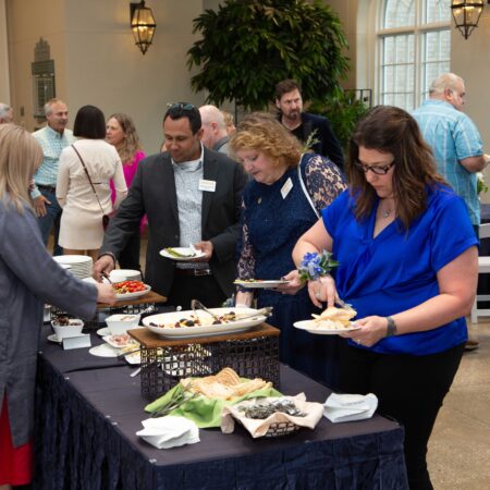a group of people at a buffet
