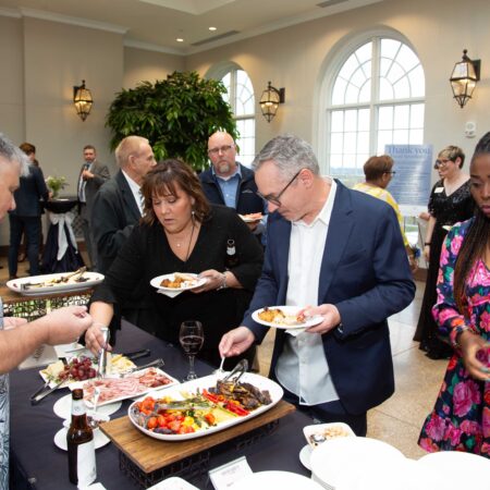 a group of people at a buffet