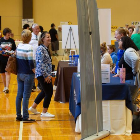 a group of people at a convention