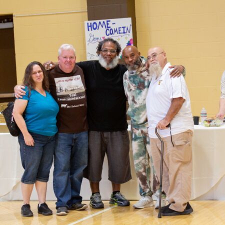 a group of people posing for a photo
