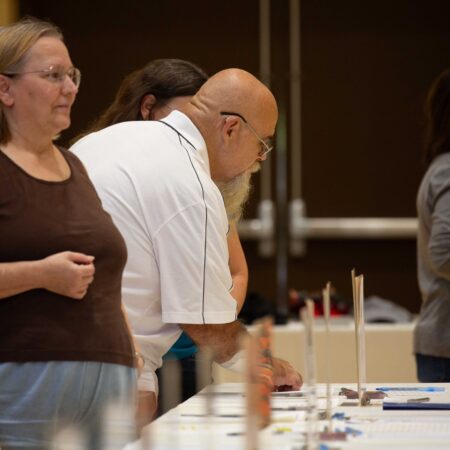 people standing at a table