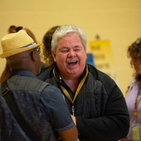 a person laughing with another person