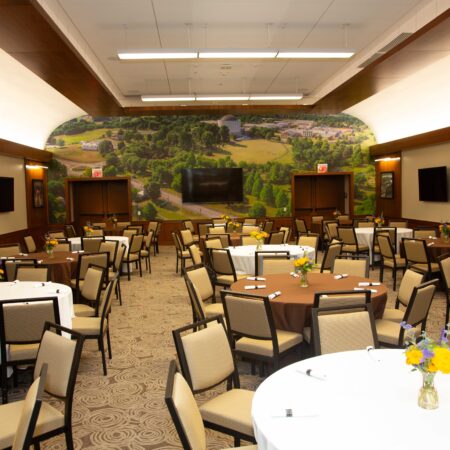 a room with tables and chairs