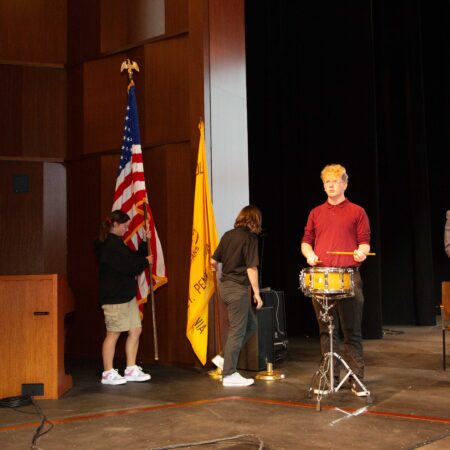 a group of people playing drums