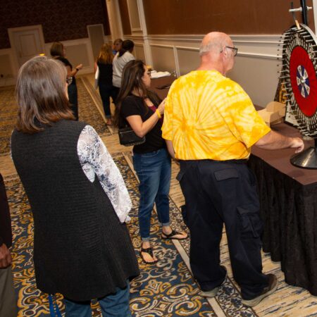 a group of people standing in a room