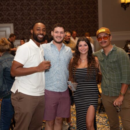 a group of people posing for a photo