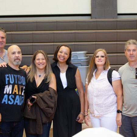 a group of people posing for a photo