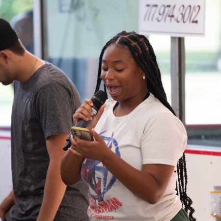 a person holding a microphone