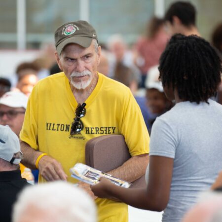 a person in a yellow shirt