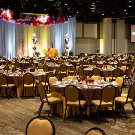 a large room with tables and chairs