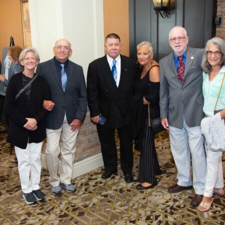 a group of people standing in a room