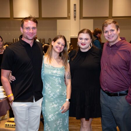 a group of people posing for a photo