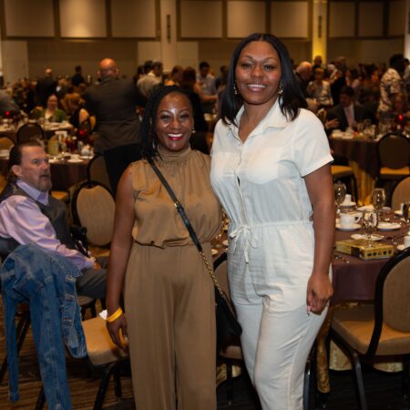 a couple of women posing for a picture
