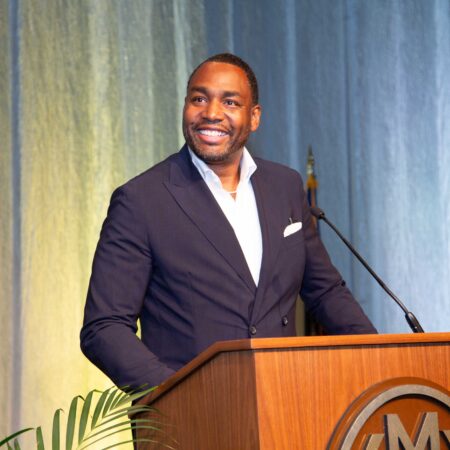 a person standing at a podium