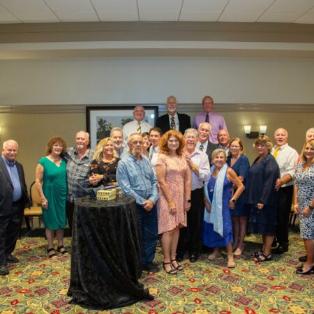 a group of people standing in a room