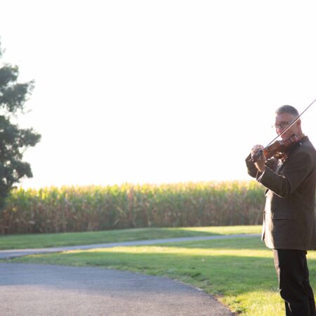 a person playing a violin