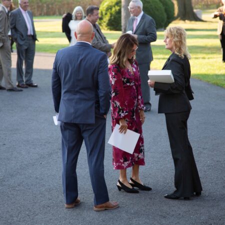 a group of people standing outside
