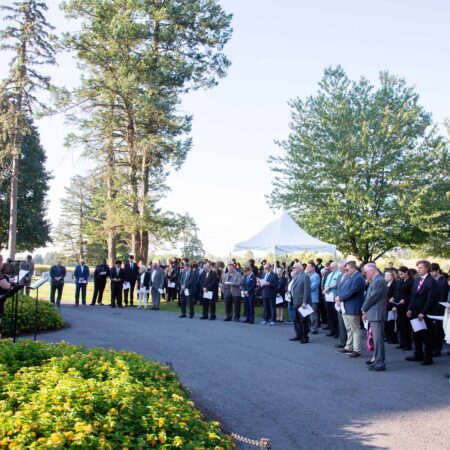 a group of people standing in a line