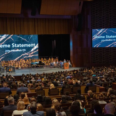 a group of people in a auditorium