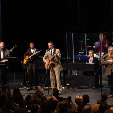 a group of people playing instruments