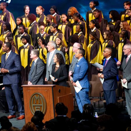a group of people standing on a stage