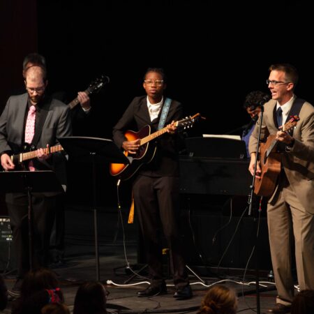 a group of people playing instruments