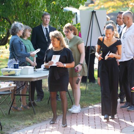 a group of people standing in a line