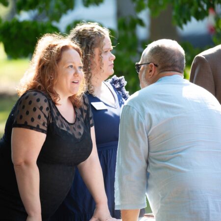 a group of people standing outside