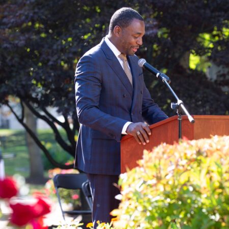a person standing at a podium