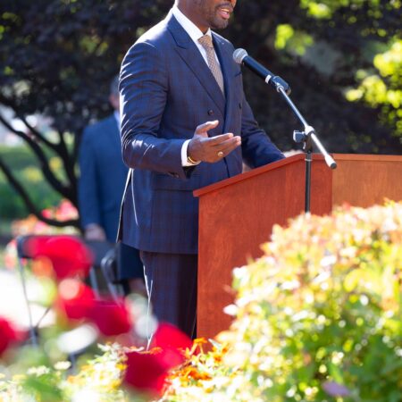 a person standing at a podium