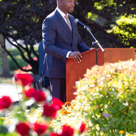 a person standing at a podium