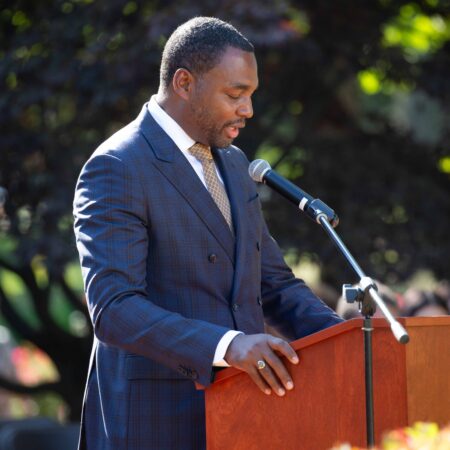 a person standing at a podium