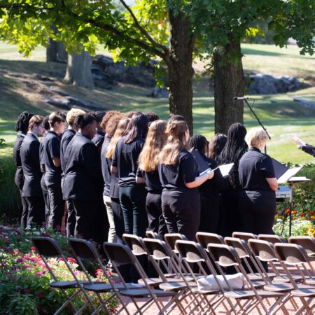 a group of people standing in a line